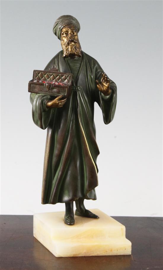 An early 20th century cold painted bronze figure of a Turkish merchant, 9in,